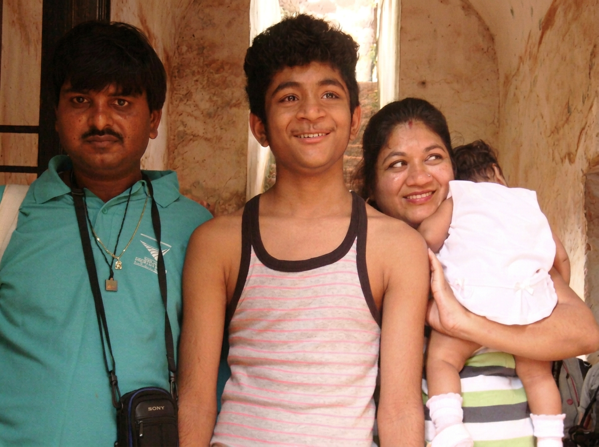 Kunal Shah with his stepdad, mom, and younger sister